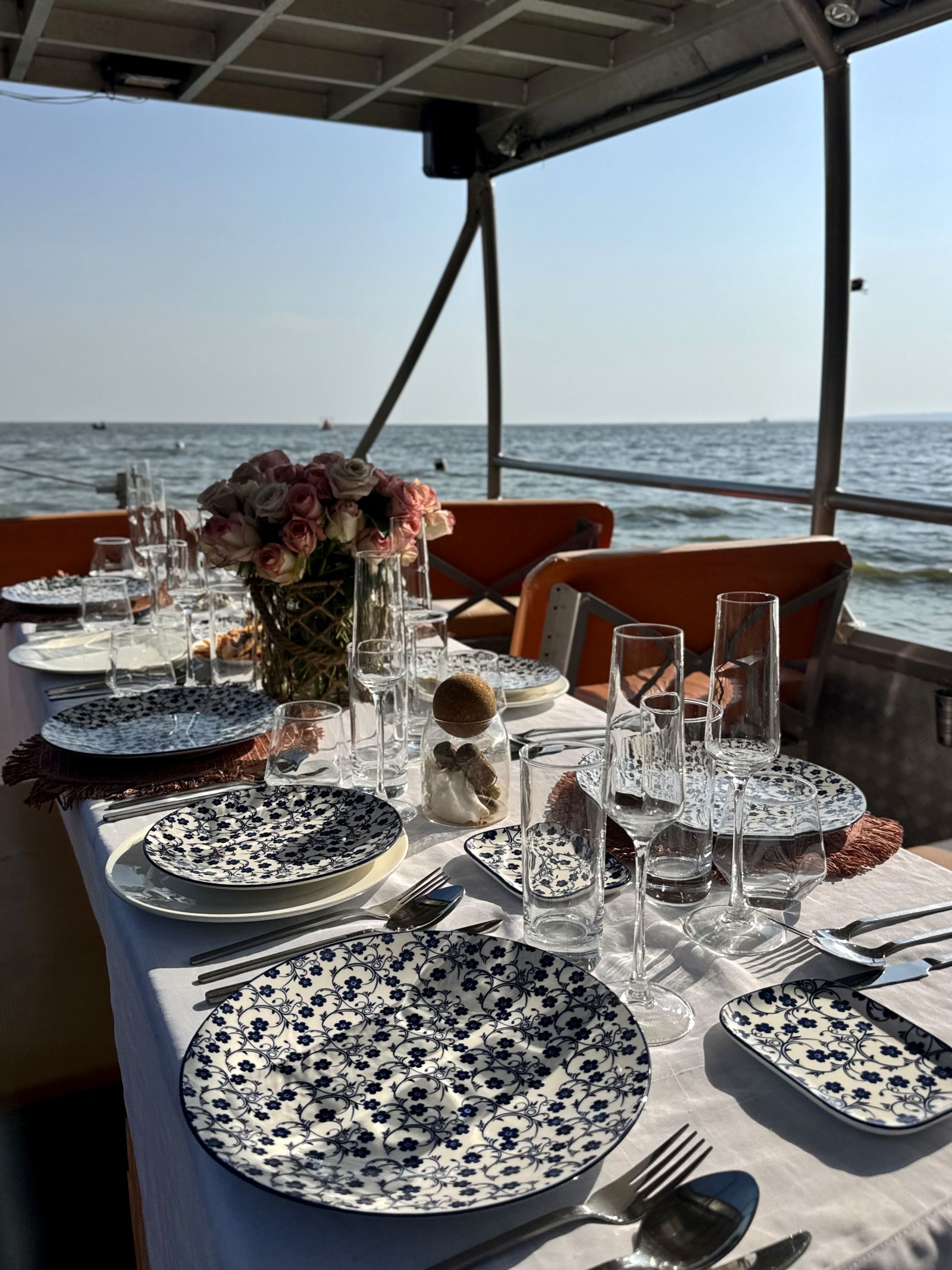A long table set for dining aboard MV Jabura II on Lake Victoria