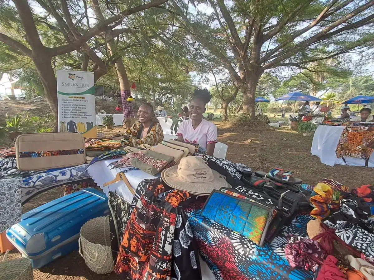A textile and tailoring stall at the Casa Kibokobay Artisan and Farmers Market